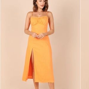 Petal & Pup boutique tangerine midi dress! Size M